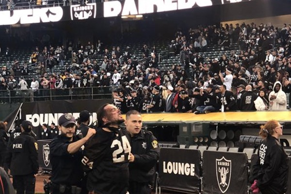 Furious Raiders Fans Throw Garbage On Field