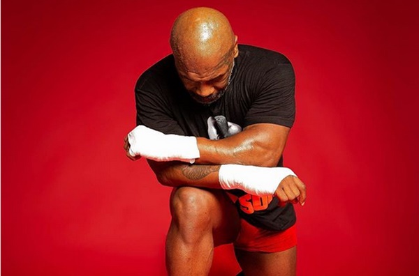 Mike Tyson Posts Photo Kneeling Amid George Floyd Anger